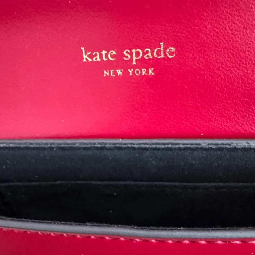 Kate Spade Cherry Red Clutch belt with Bow Accent